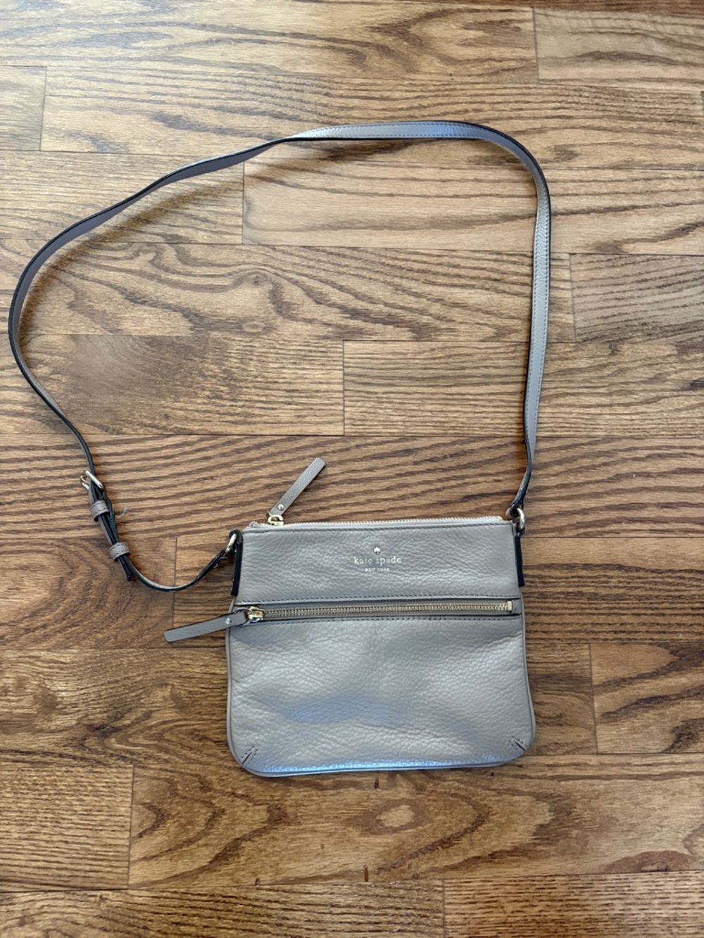 kate spade taupe colored pebbled leather crossbody with front zip